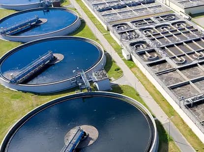 Aerial view of circular water treatment tanks for industrial applications